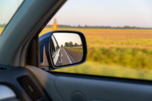 A car drives through the Oregoncountryside with a Max Cash Title Loan.